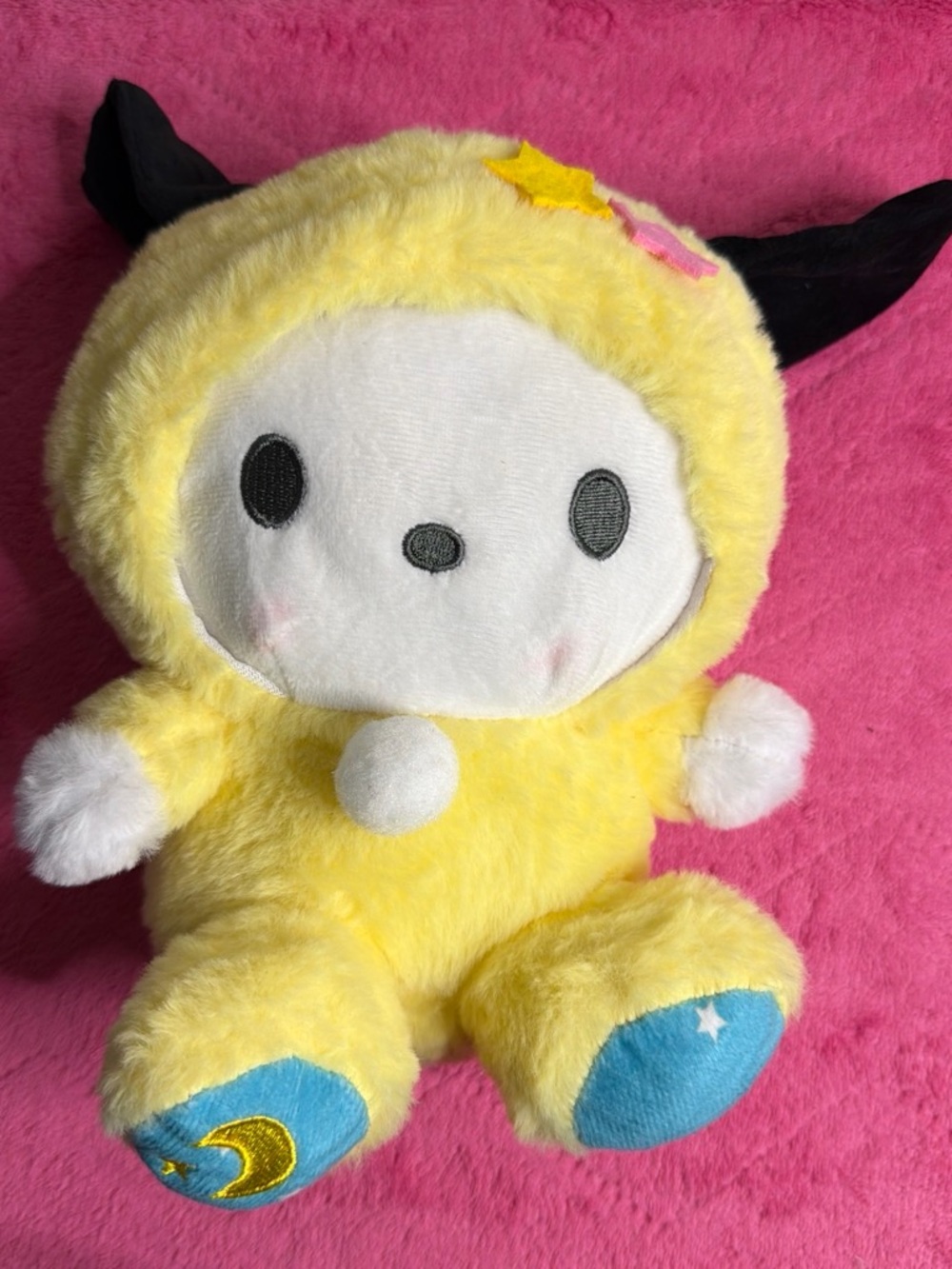 Sanrio Yellow Plush Character with Black Ears and Blue Foot Pads